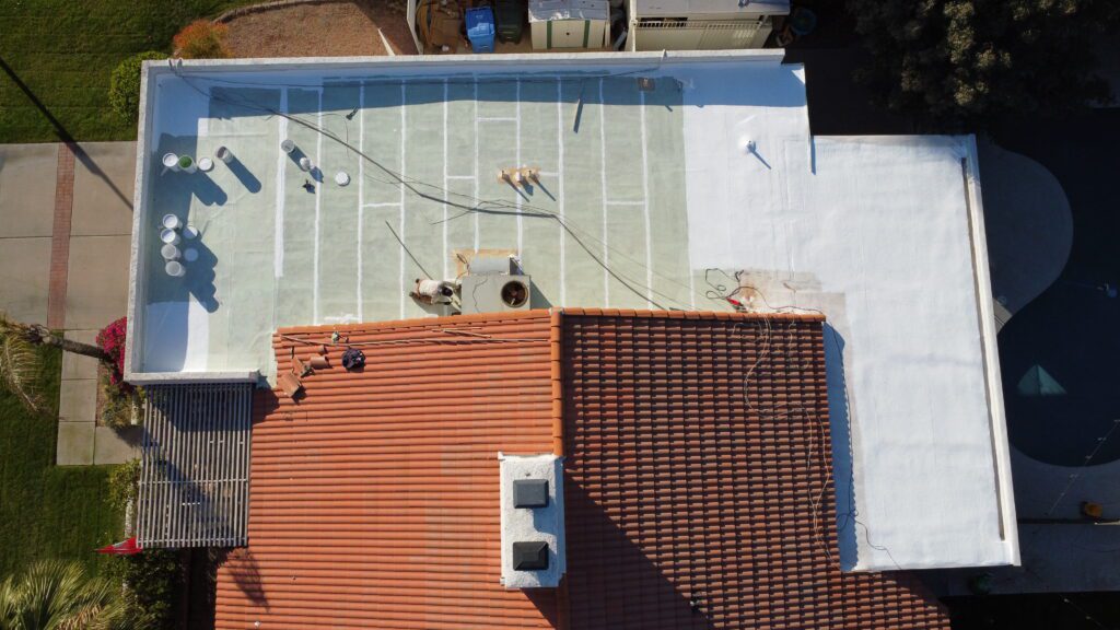 Foam Roofing Phoenix installation on a residential flat roof by Zona Roofing